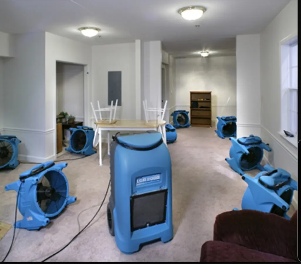 Air movers and dehumidifier setup for Water Damage Restoration in Kenai